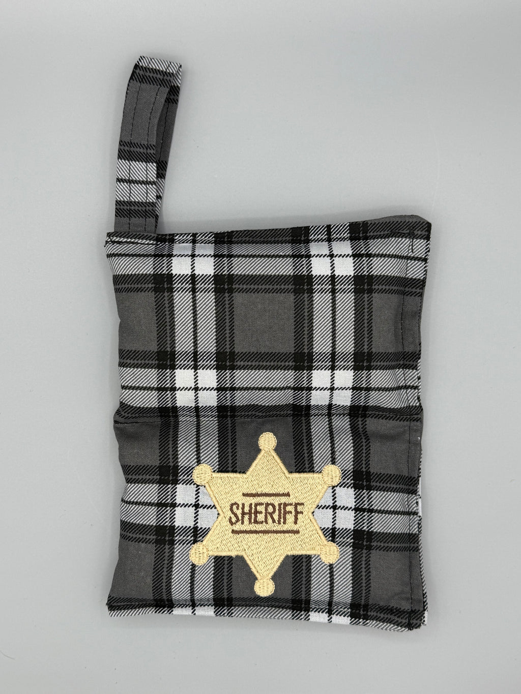 Charcoal Plaid horse bit warmer open with outside displayed