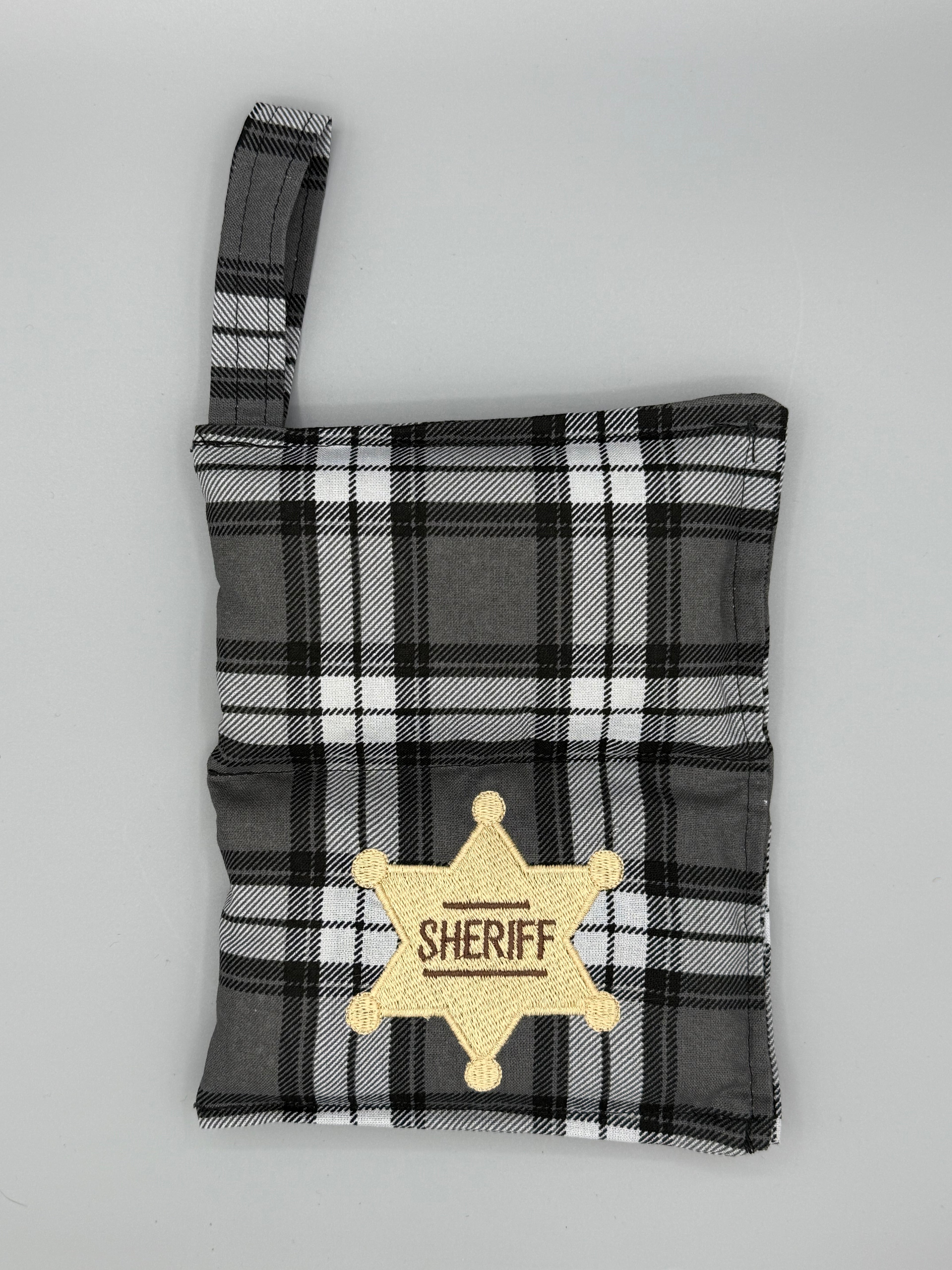 Charcoal Plaid horse bit warmer open with outside displayed