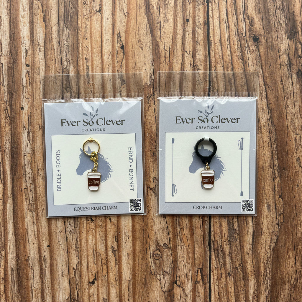Two packages of Ever So Clever coffee cup charms on a wood background