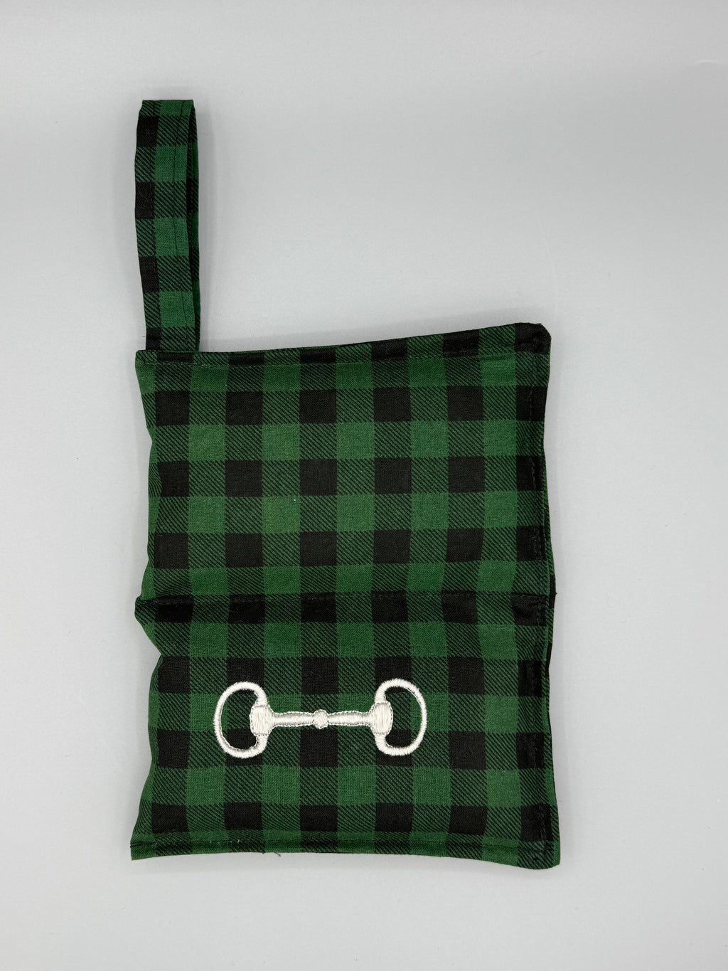 Green Buffalo Plaid horse bit warmer open with outside displayed
