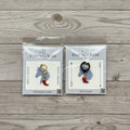 Hot pepper charms in Ever So Clever Creations packaging on wood background