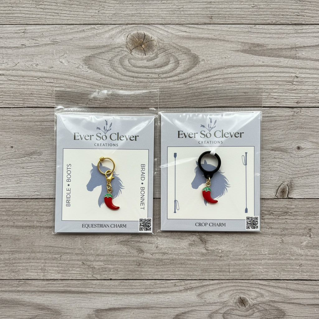 Hot pepper charms in Ever So Clever Creations packaging on wood background